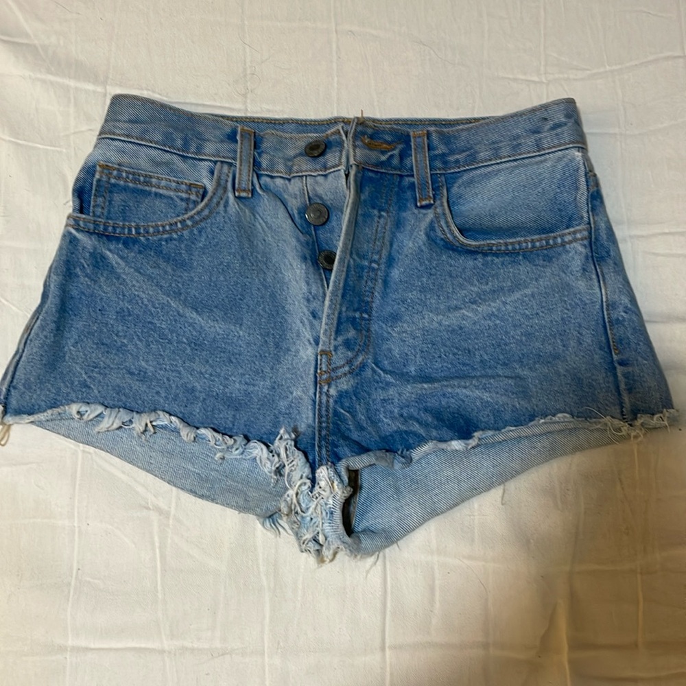 Slightly high waisted blue jean shorts